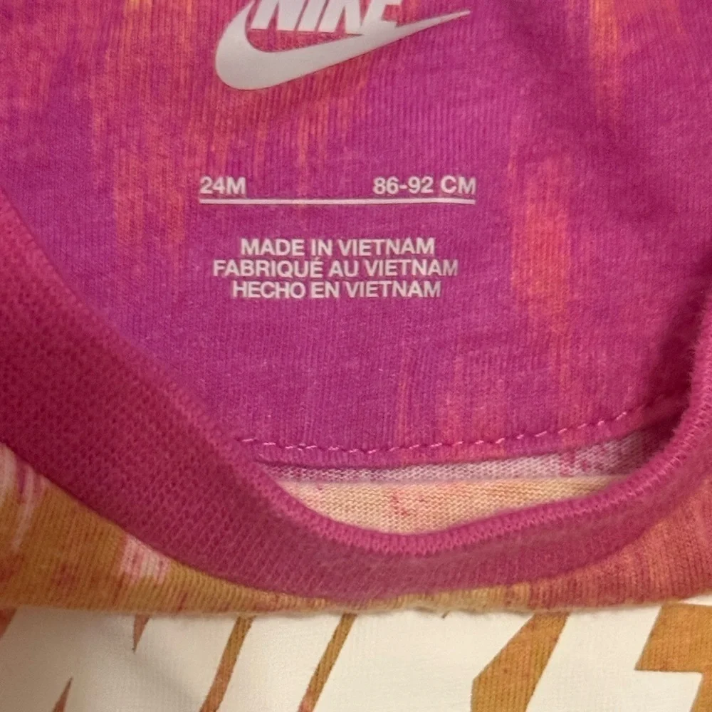Nike Kids Bodysuit in Pink and Orange